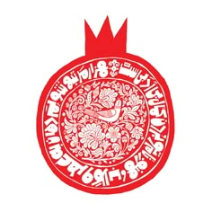 a red and white ornament with chinese writing in the shape of a pomegranate