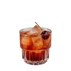 an old fashioned cocktail with ice and cherries on the rim, garnished with a cherry