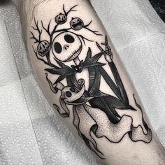 a person with a tattoo on their leg