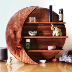 a wooden shelf that has various items on it