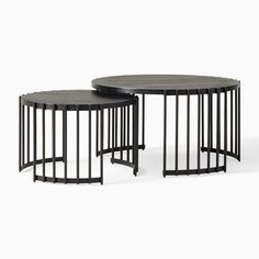 two tables with metal bars on each side and one has a black table top in the middle