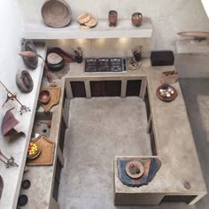 an aerial view of a kitchen with pots and pans