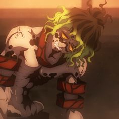 a cartoon character with dreadlocks crouching down in front of a wall and looking at the ground