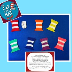 the cat in the hat book is next to some colorful pillows and a card with an information page