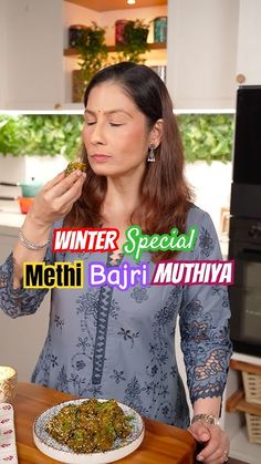 a woman standing in front of a table with food on it and the words winter special methi baji muthiya