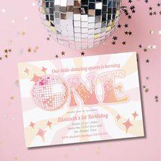 a pink birthday party with disco ball and stars