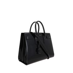 The Sac De Jour Small Brushed Leather Handbag by SAINT LAURENT is a sac de jour small brushed leather handbag crafted to the highest standards, offering both style and functionality. Makeup Travel Case, Valentino Black, Small Handbag, The Saint, Travel Makeup, Small Handbags, Travel Case, Beauty Accessories, Leather Handbag