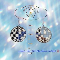 a pair of earrings that have been designed to look like checkered globes and the words meet me at the news wheel