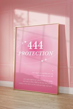 a pink poster with the words protection on it in front of a pink wall and wooden floor