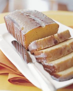 slices of pound cake on a plate with a knife