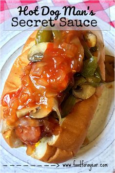 a hot dog on a bun covered in ketchup and relish