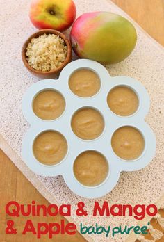 there is a muffin tray with apples and mangos on the table next to it