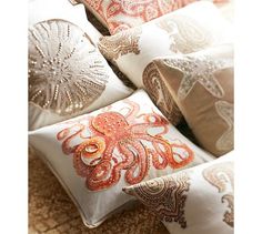 decorative pillows with an octopus on them