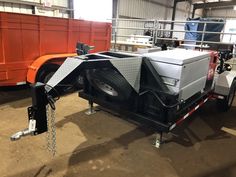 the trailer is being loaded and ready to be used for transporting other things in the storage area