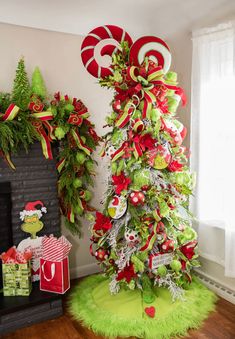 a christmas tree decorated with candy canes and bows