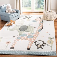 a child's room with a blue chair and white rug