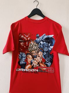 Vintage 2000 Y2K Dragon Ball Z Licensed T-shirt Red Size M Brand new, unworn without tags - 10/10 - 100% Authentic Measurements : Chest : 19.68 in / 50 cm Length : 27.95 in / 71 cm Red Y2k Crew Neck T-shirt, Y2k Red Graphic Print Top, Red Y2k Cotton T-shirt, Red Y2k Style Cotton T-shirt, Y2k Fan Merchandise Tops With Logo Print, Red Graphic Print 90s Style Top, 90s Style Red Top With Graphic Print, Red Streetwear T-shirt With Front Print, 90s Red Streetwear Shirt