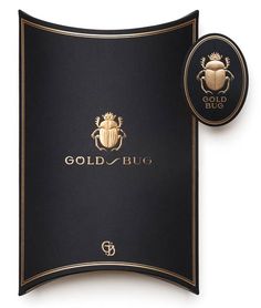 the gold bug logo is shown next to an image of a black and gold beetle