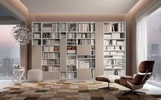 a living room filled with lots of furniture and bookshelves next to a window