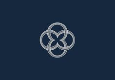 the logo for an artisan company, with three overlapping circles in white on a dark blue background