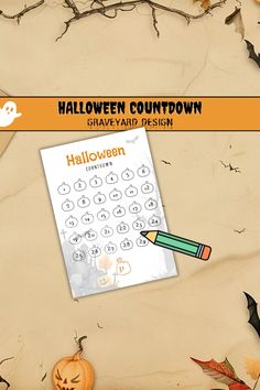 a halloween count down sheet with a pencil on it