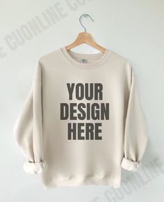 showcase your sweatshirt designs with our hanging Sand gildan 18000 sweatshirt mockup. The perfect Sand flat lay hanging mockup to showcase your designs!   ✨Details✨ This is a digital download ONLY This image is for the Gildan 18000 Sweatshirt ✨Download Includes✨ 1 high-resolution JPG free of watermark and branding. ✨Notes✨ THIS IS A DIGITAL PRODUCT, NO physical item will be delivered Once the payment is cleared through Etsy you will receive an email with the download link. You can also download it from the Profile Purchases via Etsy. ✨Terms of Use ✨ THE FOLLOWING PERMISSIONS ARE HEREBY GRANTED TO THE LICENSEE: - You may place your graphic or logo onto the image. - You may crop or rotate the image as needed. - Personal and commercial use is permitted. THE FOLLOWING ACTIONS ARE STRICTLY PRO Customizable Fleece Crew Neck Sweatshirt, Customizable Fleece Crew Neck Top, Gildan Sweatshirt, Sweatshirt Mockup, Gildan Sweatshirts, Design Skills, Sweatshirt Designs, Long Sleeve Sweatshirts, Mockup