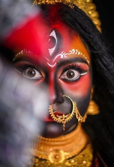 a close up of a person with makeup on