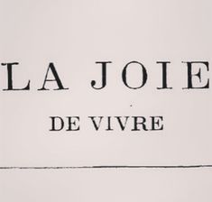 the words la joie de vivre are written in black ink on white paper