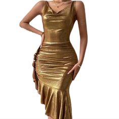 Metallic Gold Asymmetrical Ruffle Evening Dress. Beautiful Asymmetrical Cut Dress. Features; Asymmetrical Cut Hemline With Ruffles Ruching Sides Design Spaghetti Crossover Straps At Back Cowl Front Neckline Gold Metallic Stretch Fabrication Pullover Design No Zipper Size-12 Bust-37 Inches Waist-31 Inches Length-57 Inches 95% Polyester 5% Elastane Machine Wash Cold Gold Ruffle Dress Cocktail Dress Date Night Dress Holiday Gold Dress Stretch Special Occasion Dress Gold Asymmetrical Cocktail Dress, Luxury Ruched Asymmetrical Dress, Ruffle Evening Dress, Pre-draped Ruched Asymmetrical Cocktail Dress, Gold Ruffle Dress, Spring Asymmetrical Ruched Pre-draped Dress, Pre-draped Asymmetrical Sleeveless Ruched Dress, Dress Date, Dress Date Night