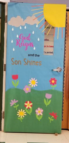 a door decorated with flowers and the words god reign and son shines on it