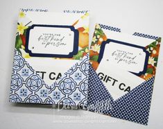 three cards with different designs on them and the words gift card written in black ink