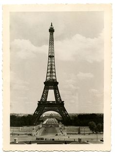 the eiffel tower is shown in black and white with pink writing on it