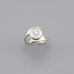 Ancient Shiva Round Shell Eye Ring Silver Jewelry CODE: SER34 Material: 925 Sterling Silver Gem Stone: SHIVA EYE Weight: 3.67 Gram Ring Size: 6, 7, 8, 9 Finishing: silver   Price Per Piece Handmade Sterling Silver Ring with a polished natural shiva eye shell. Shiva Eye Shell is a considered a good luck and positive energy Stone. This shell is the a perfect present for all those women who loves the natural beauty. This beautiful Ancient Shiva Round Shell Eye Ring would be a perfect gift for that Silver Gem Rings, Eye Ring Silver, Ring 3 Stone, Shiva Eye, Handmade Sterling Silver Rings, Shell Ring, Rings Silver, Dope Jewelry, Funky Jewelry