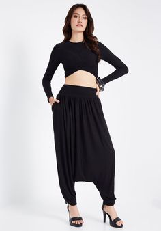 Made from super soft rayon/spandex blend. Comfort is everything with these harem pants. DETAILS: ▪ Pull-on style ▪ Drop crotch silhouette for extra comfort ▪ Ribbed elastic waistband ▪ Ribbed cuffs MEASUREMENTS: Waist: 25" (63.5 cm) stretching to 44" (112 cm) Hips: 60" (152 cm) Length: 38" (96.5 cm)   In Leg Opening: 10" (25 cm) stretching to 18" (46 cm) COLOR: Black 🔸COLOR OPTIONS🔸 Gray: https://www.etsy.com/listing/1496665111/no306-gra Rose Taupe: https://www.etsy.com/listing/1496086723/no30 Low Crotch Pants, Romper Casual, Pants Romper, Rose Taupe, Pants Details, Pants Loose, Hot Iron, Loose Pants, Romper Pants