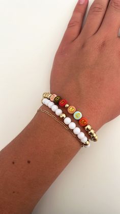 This is a super cute Dog Mom bracelet stack!! This set includes 2 bracelets. These bracelets are super strong and have been double wrapped and glued to ensure they won't break. These work perfectly for gifts and for all occasions! Disclaimer: the dainty gold chain is not included Dog Mom Bracelet Stack, Trendy Stackable Jewelry For Friendship, Gold Bracelets With Letter Beads For Best Friend, Trendy Beaded Bracelets For Mother's Day, Adjustable Stacked Bracelets As Gift, Trendy Stackable Charm Bracelet Gift, Trendy White Stretch Bracelet For Mother's Day, Trendy White Charm Bracelet With Round Beads, Trendy Stackable Beaded Bracelets