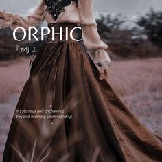 a woman in a long brown dress with the words orphic printed on her chest