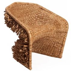 a wicker chair with wooden slats on the back and sides, folded in half