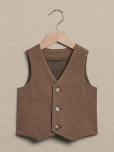 This softly structured vest is cut from a cozy flannel-like fabric with a v-neck and three-button front.  V-neck with button front.  Fully lined.  Standard fit.  To find the best fit, consult the size chart below: Tweed Vest, Cozy Flannel, Baby Shop, Aesthetic Clothes, Baby Toddler, Banana Republic, Kids Fashion, Size Chart, V Neck