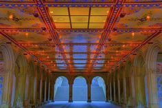 the inside of an ornate building with colorful lights