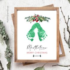 a christmas card with the words merry christmas written in green and red ink on it