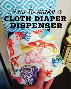 how to make a cloth diaper dispenser with pictures on the bottom