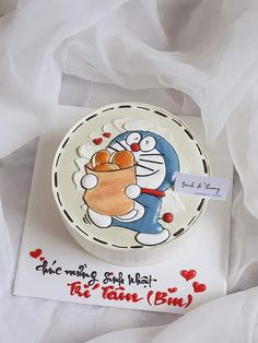 a birthday cake with a cartoon character on it