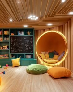 a child's playroom with lots of toys and books on the shelves in it