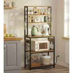 a microwave and toaster on a shelf in a kitchen