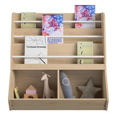 a wooden shelf filled with books and toys