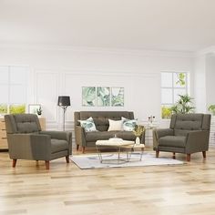 a living room filled with furniture on top of a hard wood floor covered in white walls