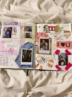 an open scrapbook with pictures and writing on the pages is laying on a bed