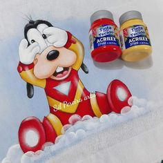 a painting of mickey mouse with two bottles of marmalade on the table next to it