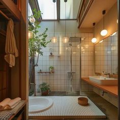 a bathroom with a shower, sink and bathtub next to a window on the wall