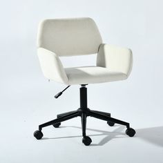 a white office chair sitting on top of a black casteors